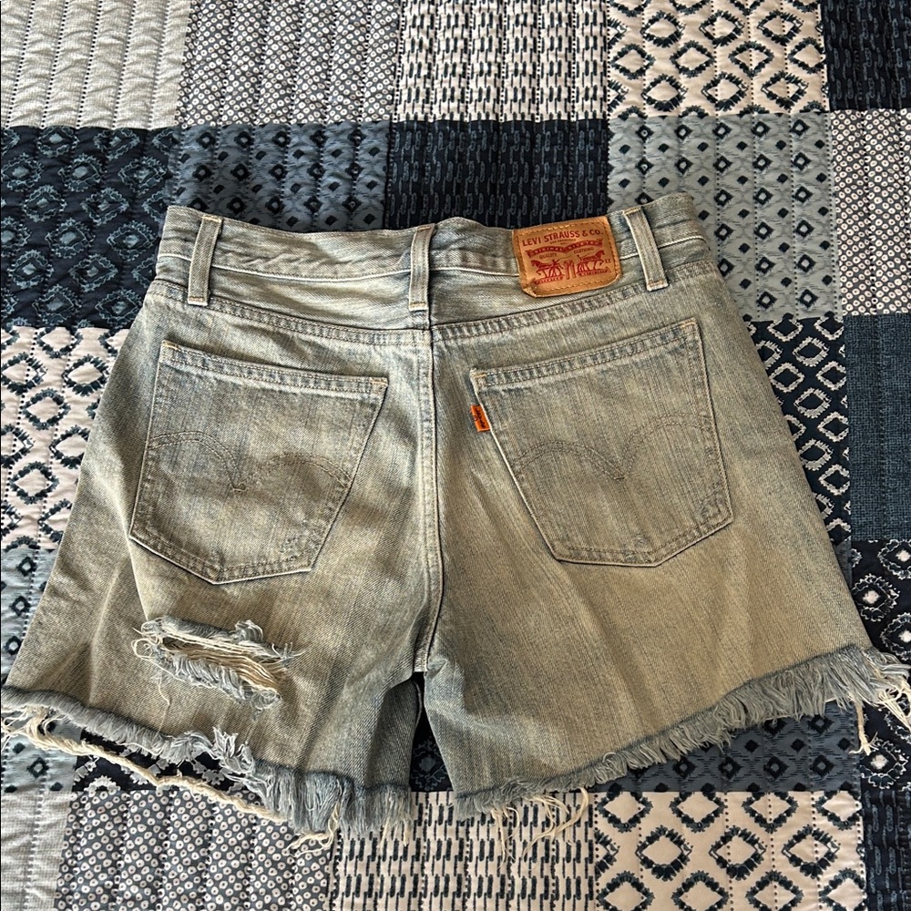 Levi's Faded Light Blue Distressed Denim Cutoff Shorts